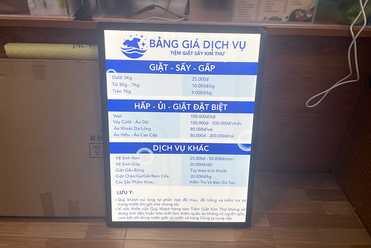 khung tranh điện quảng cáo cho tiệm giặt ủi