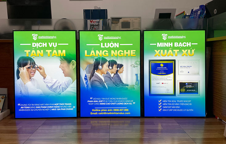 khung tranh điện cửa hàng mắt kính