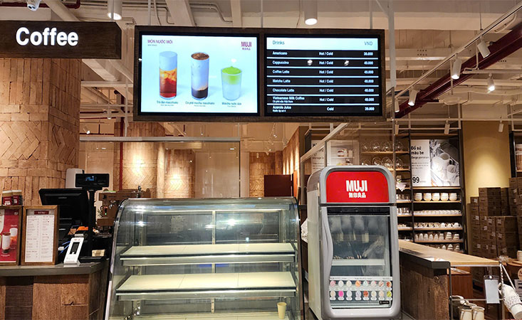 Hộp đèn siêu mỏng nắp hít màu đen làm menu phía sau quầy bar